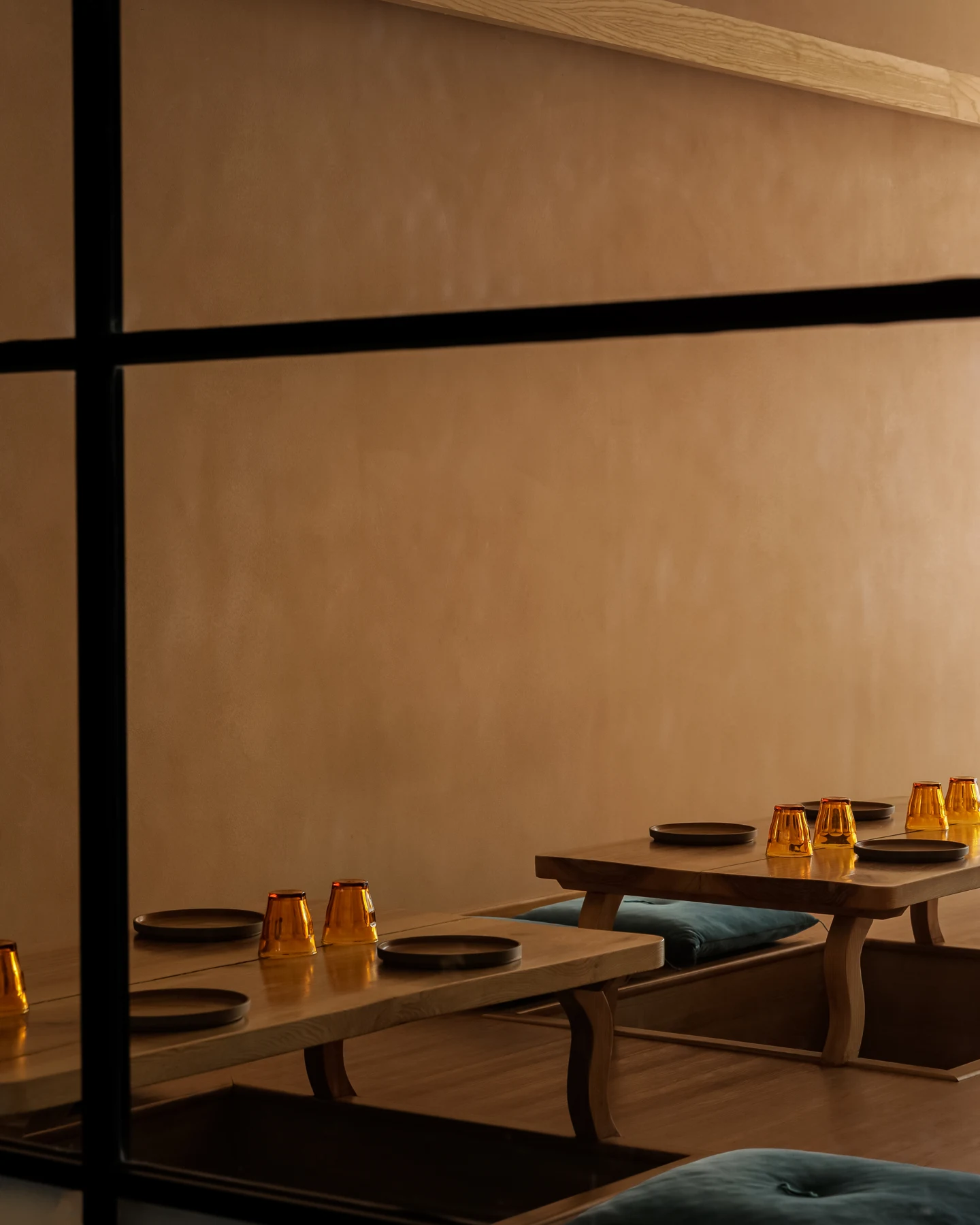 Warm light and intimate seating at IKOI